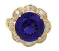 An 18 Karat Yellow Gold Tanzanite and Diamond Ring