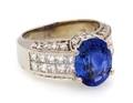 An 18 Karat White Gold Sapphire and Diamond Ring