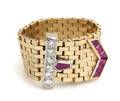 A 14 Karat Yellow Gold Diamond and Ruby Belt Ring
