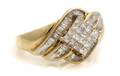 A 10 Karat Yellow Gold and Diamond Ring
