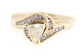 A 14 Karat Yellow Gold and Diamond Ring