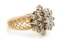 A 14 Karat Yellow Gold and Diamond Ring