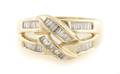 A 14 Karat Yellow Gold and Diamond Ring
