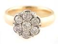 A 14 Karat Yellow Gold and Diamond Ring