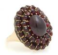 A 14 Karat Yellow Gold and Garnet Cluster Ring