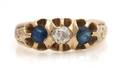 A 14 Karat Yellow Gold Sapphire and Diamond Ring