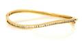 A 14 Karat Yellow Gold and Diamond Bracelet