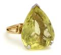 An 18 Karat Yellow Gold Platinum and Yellow Beryl Ring