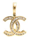 A 14 Karat Yellow Gold and Diamond Pendant