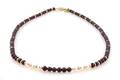 A Single Strand Garnet Bead and Cultured Pearl Necklace