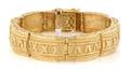 A 14 Karat Yellow Gold Bracelet in a Roman Numeral Motif