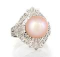 A 14 Karat White Gold Diamond and Pearl Ring