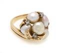 A 14 Karat Yellow Gold Diamond and Cultured Pearl Ring