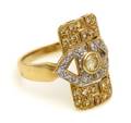 An 18 Karat Yellow Gold Yellow and White Diamond Ring