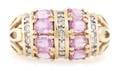 A 14 Karat Yellow Gold Diamond and Synthetic Pink Sapphire Ring