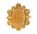 A 14 Karat Yellow Gold Citrine and Orange Jadeite Ring