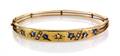 A 14 Karat Yellow Gold Sapphire Seed Pearl and Diamond Bangle Bracelet