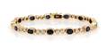 A 14 Karat Yellow Gold Sapphire and Diamond Bracelet