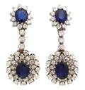 A Pair of 14 Karat White Gold Sapphire and Diamond Earclips