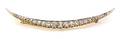 An 18 Karat Yellow Gold Platinum and Diamond Crescent Shape Brooch