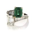 A Platinum 18 Karat Yellow Gold Emerald and Diamond Bypass Ring Oscar Heyman Brothers