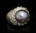 An 18 Karat Yellow Gold Cultured South Sea Pearl and Diamond Ring