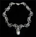 An 18 Karat White Gold Cultured South Sea Pearl and Diamond Necklace