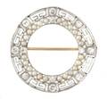 An Art Deco Platinum Diamond and Seed Pearl Pin circa 1930