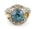 An 18 Karat White Gold Blue Zircon and Cultured Pearl Ring circa 1920