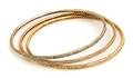 A Set of Three 18 Karat Gold and Diamond Bangle Bracelets