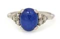 A Platinum Star Sapphire and Diamond Ring