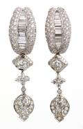 A Pair of 18 Karat White Gold and Diamond Earclips