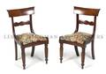 A Pair of Regency Style Walnut Side Chairs