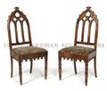 A Pair of Gothic Revival Walnut Side Chairs