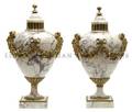 A Pair of Neoclassical Gilt Metal Mounted Marble Urns