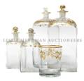 A Set of Gilt Decorated Decanters