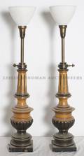 A Pair of Carved Wood and Gilt Metal Mounted Lamps