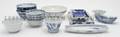 A Collection of Asian Blue and White Shaped Plates and Bowls