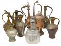 GROUP OF NINE MIDDLE EASTERN METAL PITCHERS