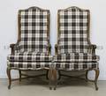 A Pair of French Provincial Wingback Armchairs