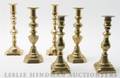 Four Pairs of Brass Candlesticks