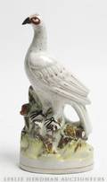 A Staffordshire Figure of a Bird
