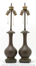 Two Bronze Bottle Form Table Lamps