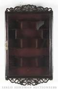 A Mahogany Oriental Style Wall Case