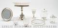 A Collection of Silver and Silverplate Mounted Table Articles