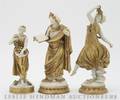 A Group of Three Continental Porcelain Gilt Figures
