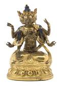 A Sino Tibetan Polychrome and Gilt Deity