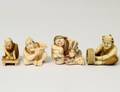 FOUR CARVED IVORY NETSUKES