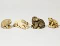 FOUR CARVED IVORY NETSUKES