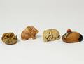 THREE IVORY NETSUKES AND ONE WOOD SHINGETSU CRANE